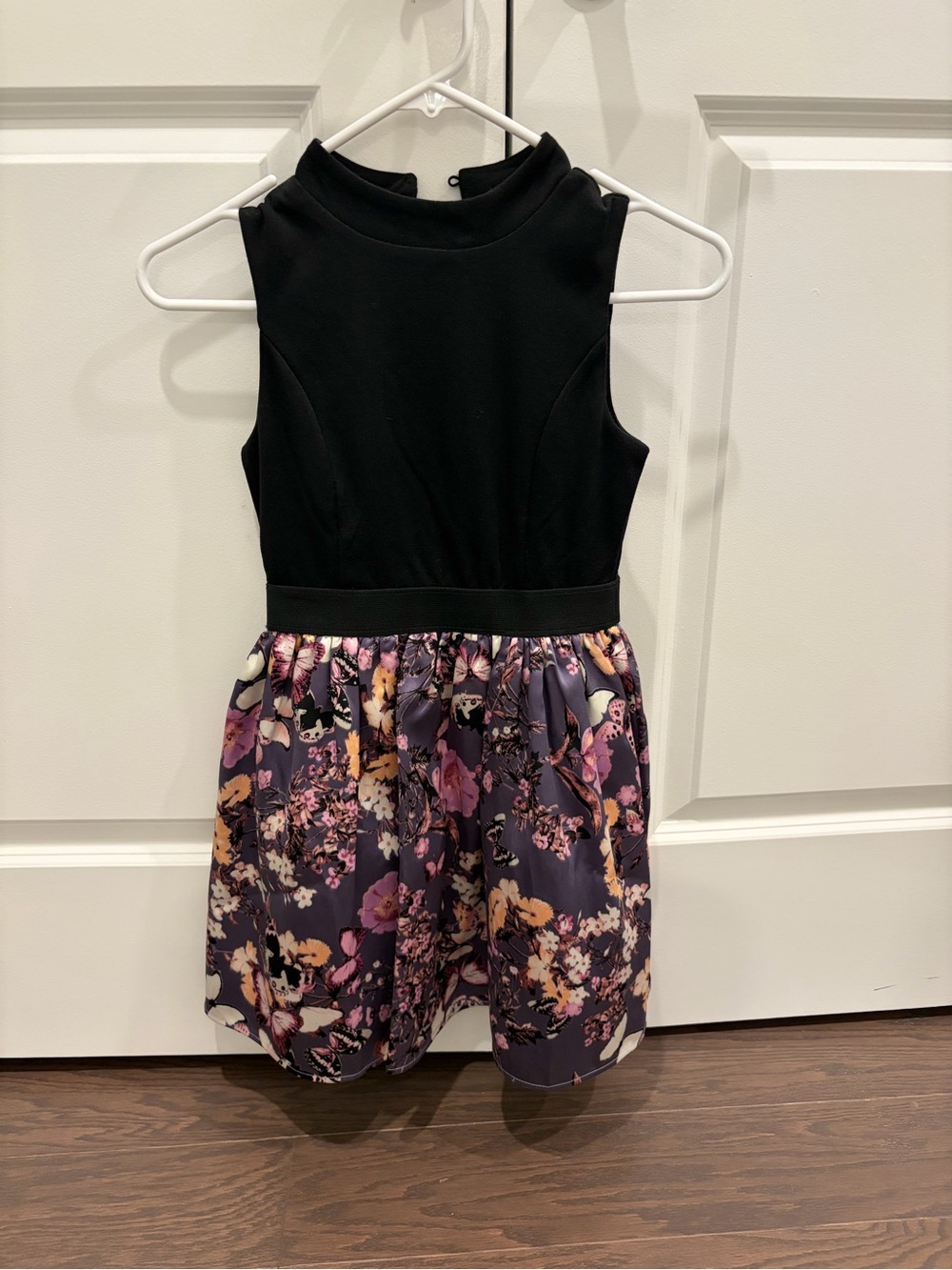 Girl’s sleeveless floral dress, size 8